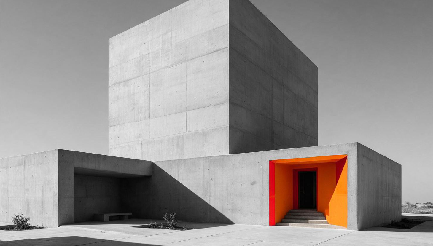 A single orange doorway in a concrete underpass